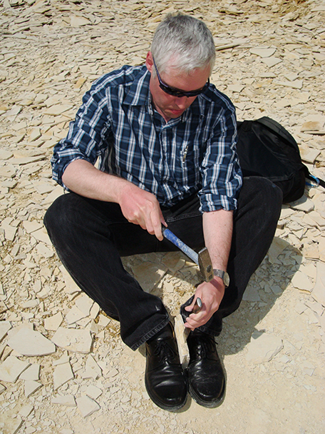 Steven learning to split Solnhofen limestone in one of the area quarries. Unfortunately, he found nothing more interesting than a plant fossil.