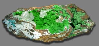 Carbon Capture: Photo of green and white calcite courtesy of Hannes Grobe via Wikipedia