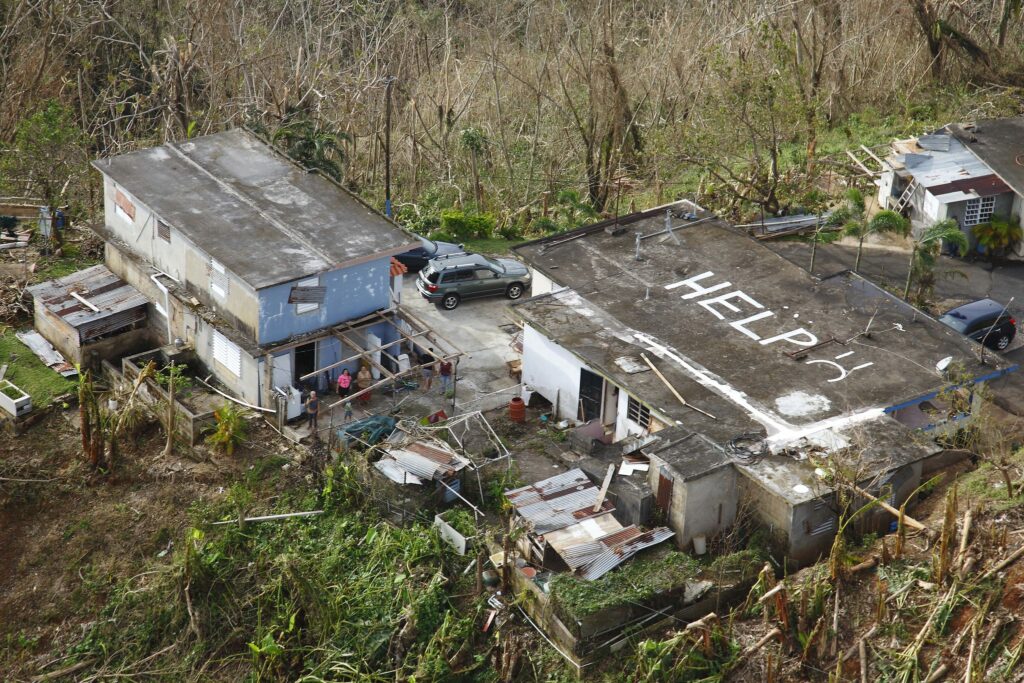 While conducting search and rescue in the mountains of Puerto Rico a CBP Air and Marine Operations Black Hawk located this home a half mile from its peek with HELP painted it is roof.