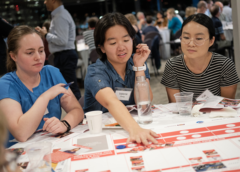 Figure Five: Forum participants choosing where to allocate resources. Image Credit: Museum of Science, Boston