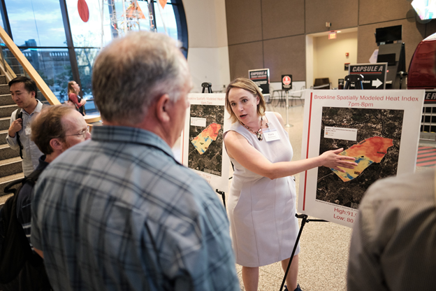 Figure Six: Kara Brewton presenting preliminary citizen science data about Brookline. Image Credit: Museum of Science, Boston