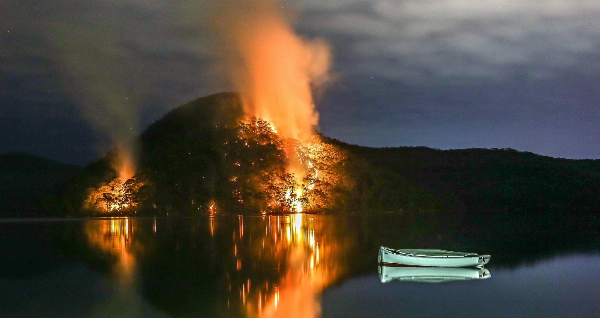 Bush Fires across Woy Woy Bay in New South Wales, Australia, Photo by Martin Snicer (CC BY-ND 2.0)
