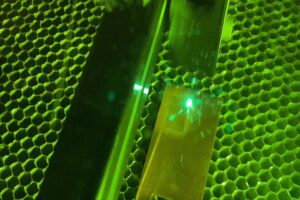 Featured image: A laser treats the surface of copper, giving it a texture that would allow the metal to instantly kill bacteria. (Purdue University/Erin Easterling)