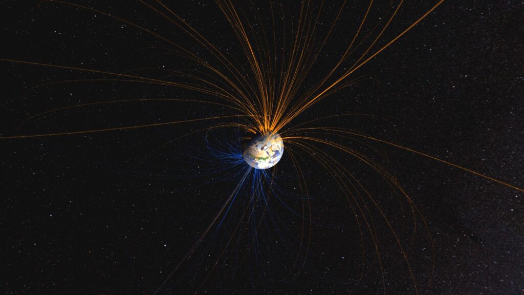 Earth's magnetic field connects the North Pole (orange lines) with the South Pole (blue lines) in this NASA-created image. (Courtesy of NASA Goddard Space Flight Center)