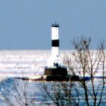 Lake Erie Dead Zone: A lighthouse on frozen Lake Erie, photo by George Bannister