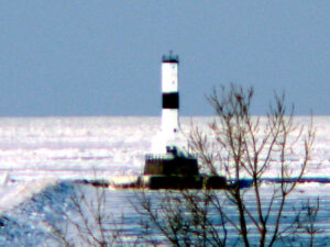 Lake Erie Dead Zone: A lighthouse on frozen Lake Erie, photo by George Bannister