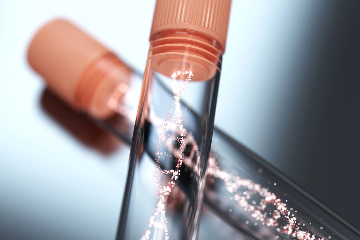 DNA strand made of small bright dots sitting in an orange-capped vial