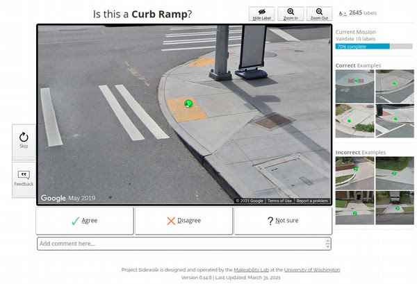 Screenshot of Project Sidewalk showing a person's legs at a street corner. Image credit: Project Sidewalk 