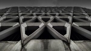 Geometric structure of the outside of a building with repeating concrete triangles